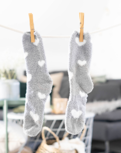 socks hanging on clothes line 