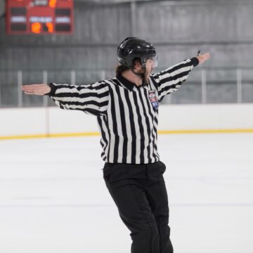 referee at ice rink